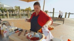 Julie Merrigan prepares a sausage dish during round 1 of American Grilled which aired July 9. Credit: Travel Channel
