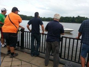 Bristol Borough Fire Officials speak with boater about reported accident. Image Credit Jeff Bohen LevittownNow.com