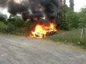 Alleged stolen vehicle engulfed with flames on Saturday.