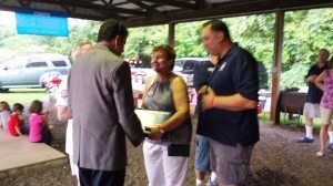 Image Credit:  Erich Martin LevittownNow.com Congressman Mike Fitzpatrick with Falls GOP's  Mike Falkevitz  observing present award to Jane Burger last Saturday. 