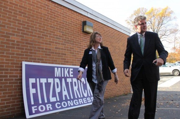 Congressman Mike Fitzpatrick and his wife walk into his polling place. Credit: Tom Sofield/LevittownNow.com