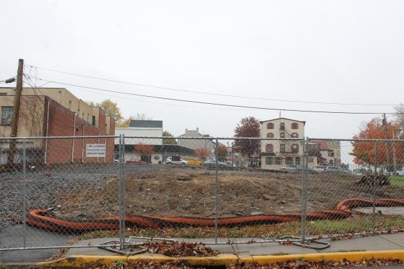 In just months, the now empty site that was the former Stocks Cafe at the base of Mill Street will start to look a lot different. JVS Properties of Moorestown, N.J. will lead the project that will include construction of a similar looking building on the same land. Demolition crews took down the deteriorating Stocks Cafe building recently. The new building is expected to feature "luxury" apartments, an eatery with a bar and a patio that faces the Delaware River. Credit: Tom Sofield/LevittownNow.com