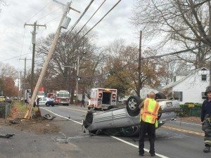 Overturned vehicle in Croydon after it struck a pole Tuesday morning.