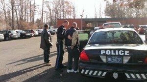 SEPTA and Middletown police load Charles Stier into a patrol car Thursday morning in Levittown. Credit: Tom Sofield/LevittownNow.com