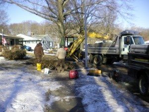 Crews from the  working on a burst pipe in the area of Thaliabush and Timber lanes in Falls Township last week. Credit: Erich Martin/Levittownnow.com