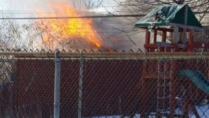 Flames shooting from the home.  Credit: Submitted