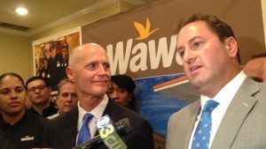 Florida Gov. Rick Scott, left, and Wawa CEO Chris Gheysons announce Monday that the convenience store chain will expand its reach in Florida. Credit: PA Independent