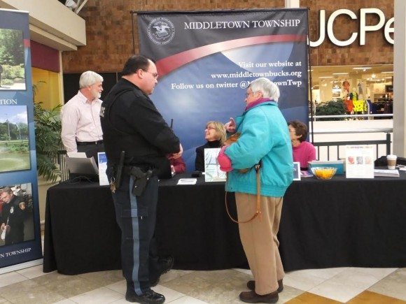 Officer Glenn McPherson speaks with a resident. Credit: Middletown Township