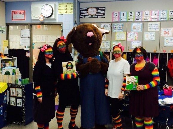  The Cookie Mouse, who visited the Kindergarten and first grade classes, is shown here with three of the school's first grade teachers (from left), Shannon Kelly, Liz Patton, and Rene Burns, along with Reading Specialist Alisa Myles. The teachers and Ms. Myles are dressed as the Camilla Cream character from the book, "A Bad Case of Stripes," by David Shannon. Credit: Pennsbury School District