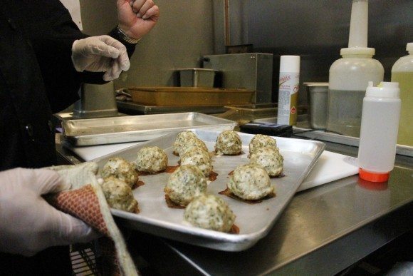 Fresh meatballs coming out of the oven.  Credit: Tom Sofield/LevittownNow.com