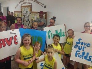 League players at the school board meeting.  Credit: Jessica Wilson-Rule