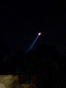 A spotlight from a police helicopter shines down over Elderberry.  Credit: Robin Borden Luberski