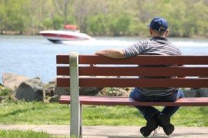A man sits along the Delaware River in Bristol Borough. Credit: Tom Sofield/LevittownNow.com