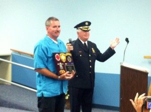 John Trindle is honored by the crowd at Tuesday's meeting in Falls. Credit: Amanda Kuehnle/LevittownNow.com