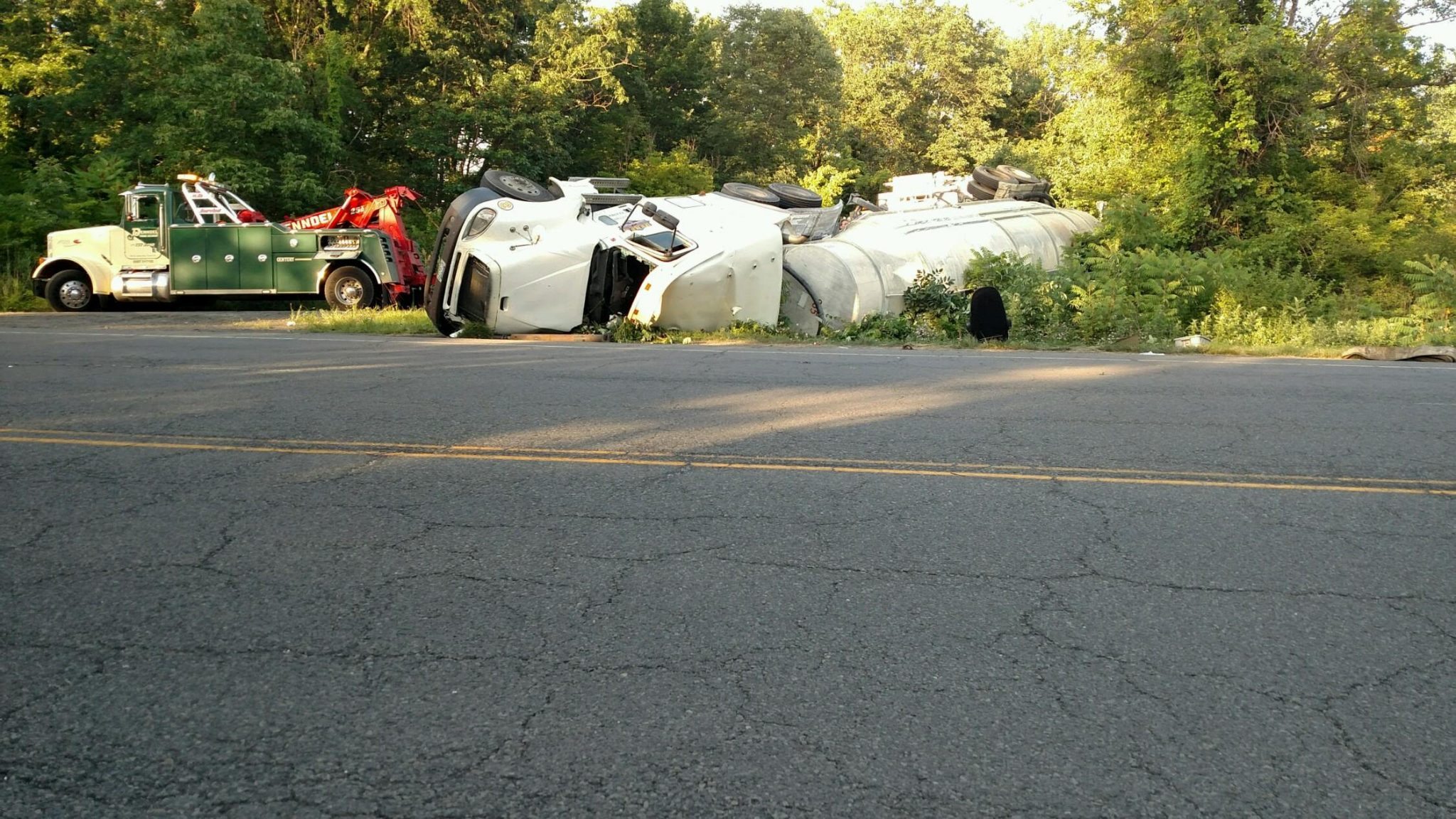 Firefighters Work For More Than An Hour To Free Trucker