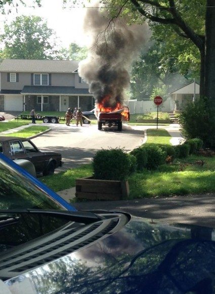 A pickup truck burst into flames in a dramatic scene in Levittown's Thornridge section. Falls Township police along with firefighers rushed to the scene late Friday afternoon. After a few minutes, the flames were knocked down by firefighters. No injuries were reported.  Credit: Paul Secoolish