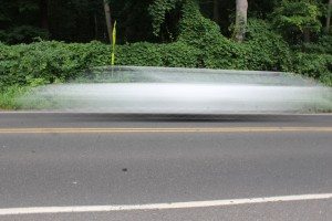 A car passed on South Flowers Mill Road in Middletown. Credit: Tom Sofield/LevittownNow.com