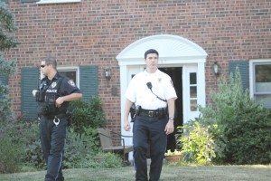Police exiting the home shortly after the stabbing. Credit: Tom Sofield/LevittownNow.com