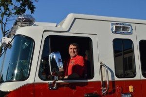 Chief Frank Farry prepares to back the new truck into the fire station.  Credit: Tim Reeves/Submitted