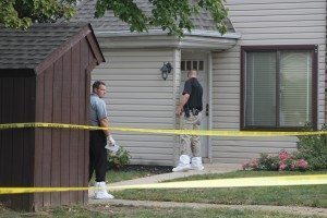 Detectives outside apartment 105 and 106.  Credit: Tom Sofield/LevittownNow.com