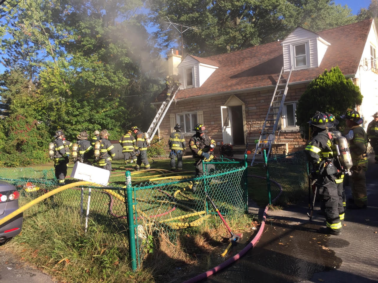 Firefighters Rescue Pets From Burning House