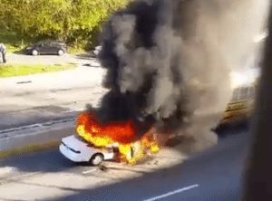 The car and bus ablaze around the time of the shooting. Credit: Twitter