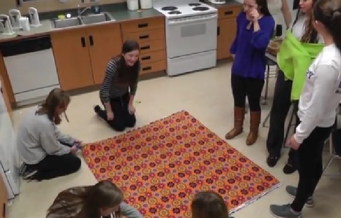High School Students Make Blankets For Homeless Teens