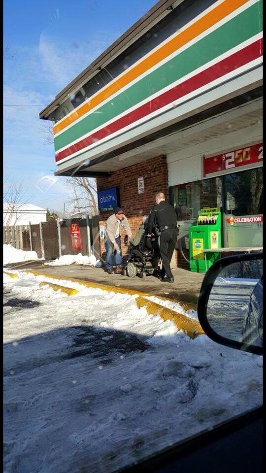 Officer, Good Samaritans Help Push Wheelchair-Bound Man Home