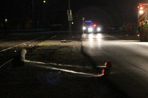 Lights shine on a utility pole that is part of the investigation into the crash. Credit: Tom Sofield/LevittownNow.com