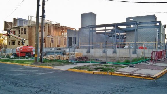 Work on e condos, five townhomes and a restaurant being constructed at the old Stocks Building site at the base of Mill and Radcliffe streets.  Credit: Tom Sofield/LevittownNow.com
