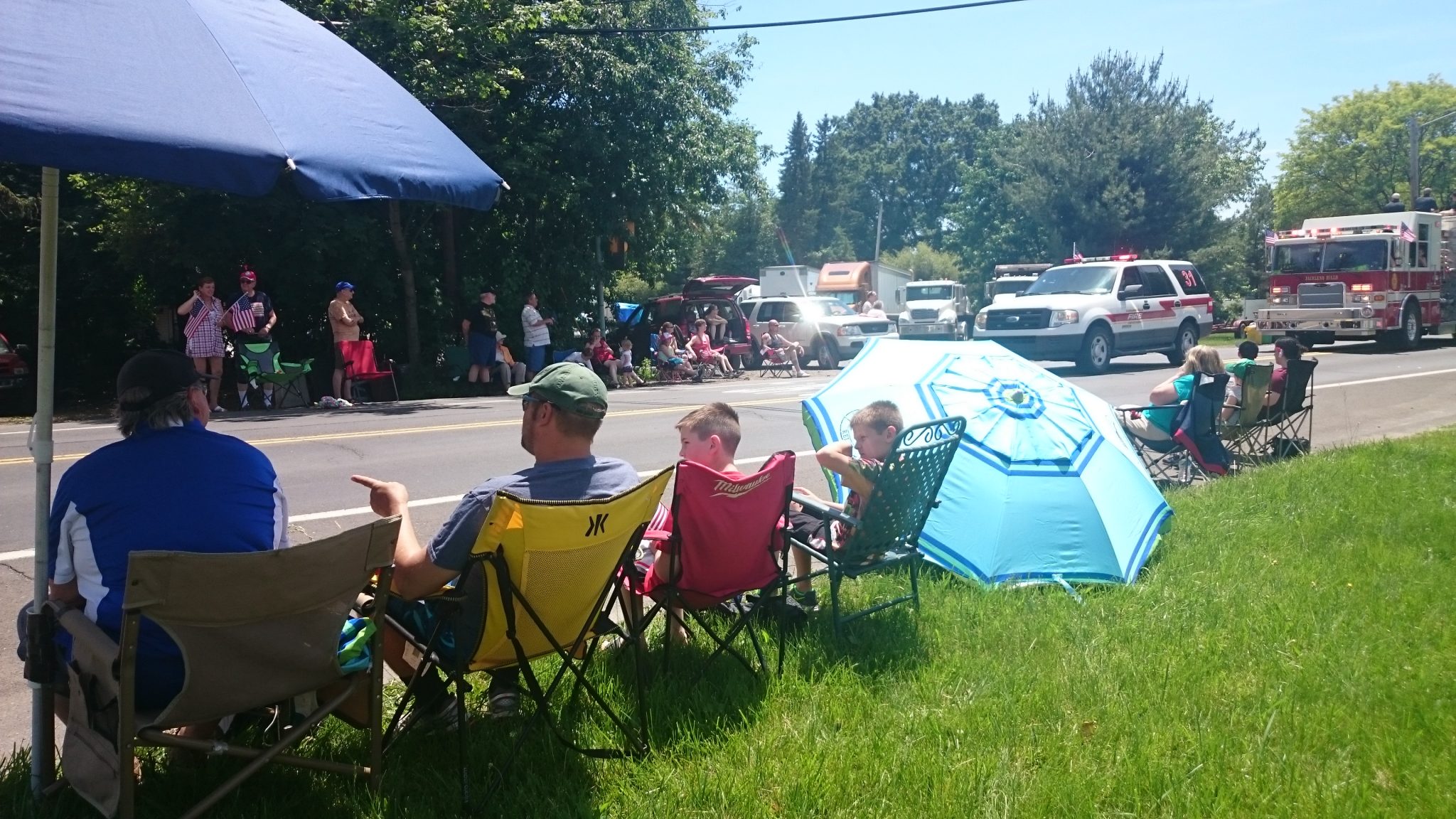 Crowds Line New Falls Road For Memorial Day Tradition