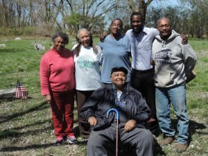 Members of the “Juneteenth” celebration are, from left: Sandy Harris, Gerlyn Williford, Brenda Cowan, Maurice Charles and Stan Griffin. Seated is Harvey Spencer. Credit: Petra Chesner Schlatter