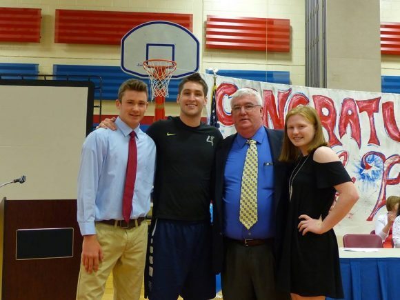 Ryan Arcidiacono (second left) at the promotion ceremony.  Credit: Neshaminy School District