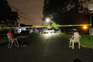 Neighbors watching the police activity. Credit: Tom Sofield/LevittownNow.com