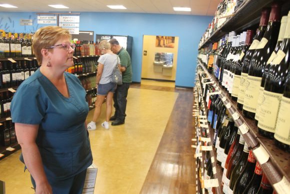 Sesan Blasch of Fairless Hills browses at the new store last week. Credit: Tom Sofield/LevittownNow.com