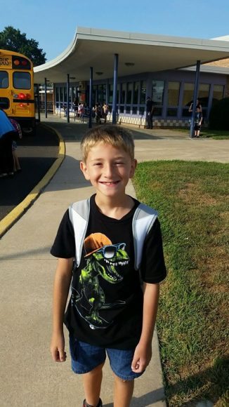 Brian heading to the first day of third grade! Credit: Michelle Moore