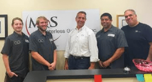 M&S Centerless Grinding Owner John Shedgda (center) with (from left-right) Dylan Rearick, Andrew Garvey, Angel Rodriguez and John Burkhardt.