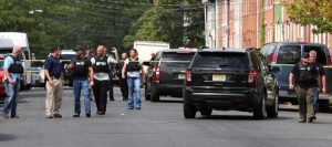 Police at the scene of last week's shooting on Spring Street in Trenton. Credit: Kevin Shea/NJ Advance Media