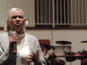 Gayle Evans, peace educator for The Peace Center in Langhorne, leads the recent Day of Healing and Reconciliation. Credit: