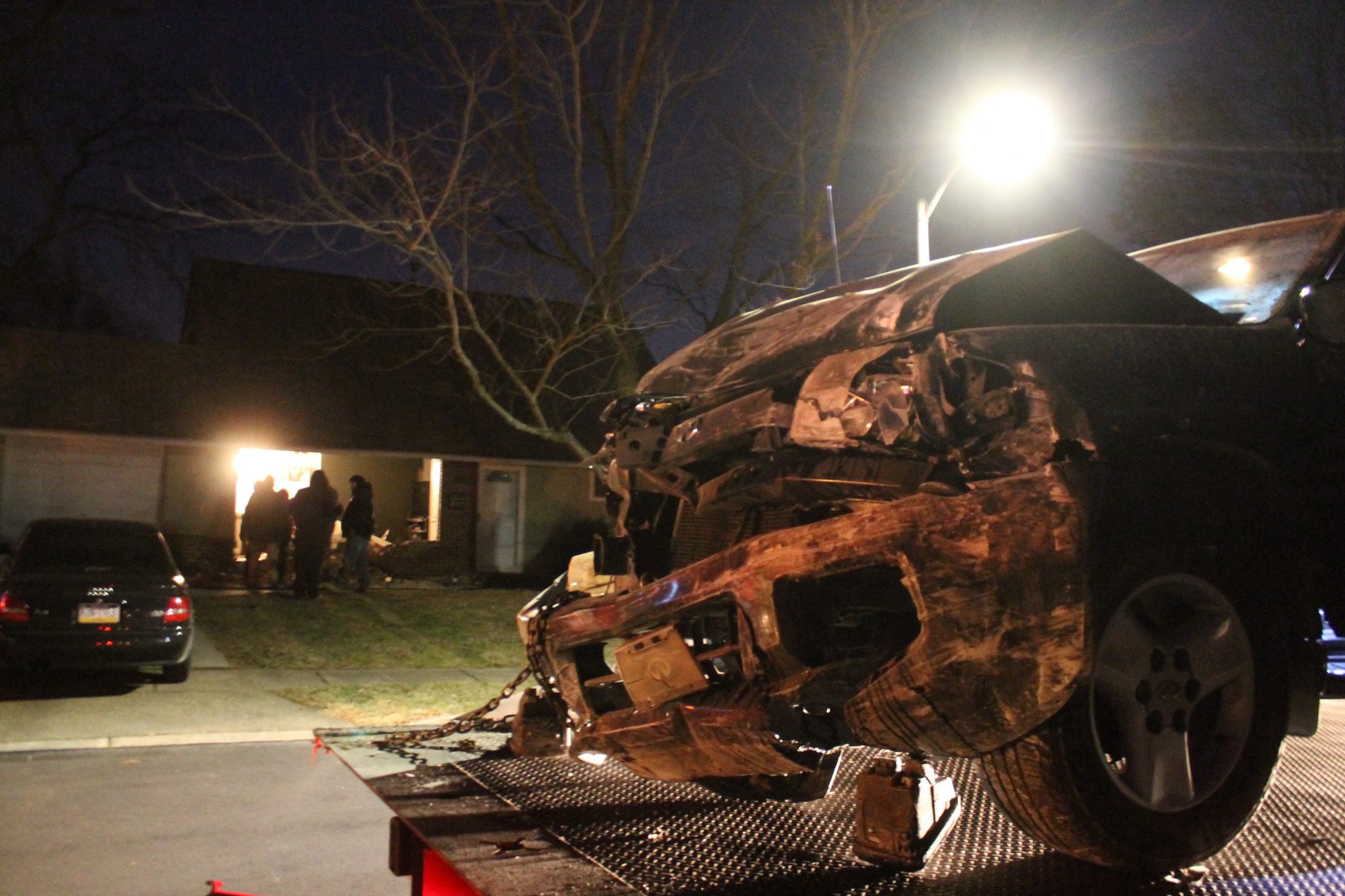 Woman Crashes Through Two Homes