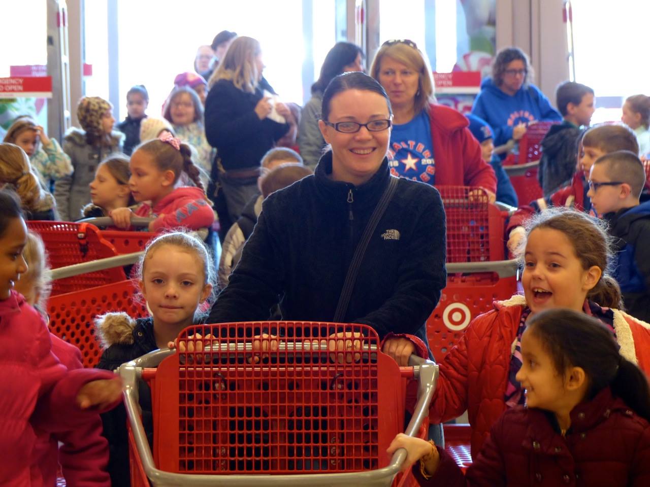 Elementary School Students Shop For Peers In Need