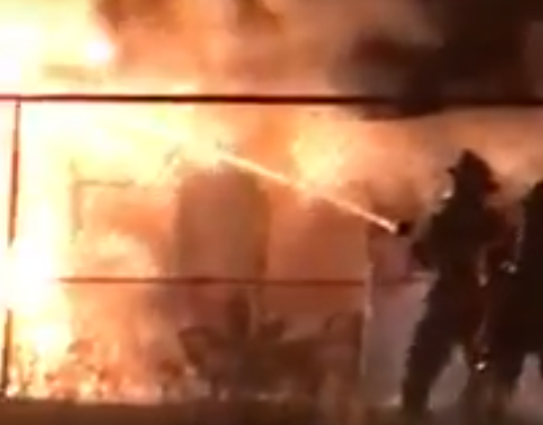 Home Heavily Damaged In Overnight Fire