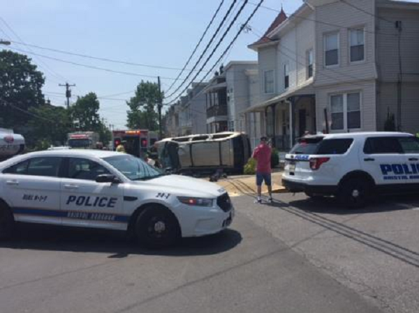 Minivan With Baby Inside Overturns