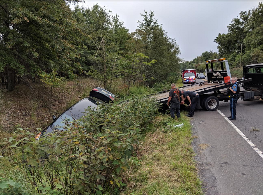 Car Ends Up In Water-Filled Ditch Near Burlington-Bristol Bridge