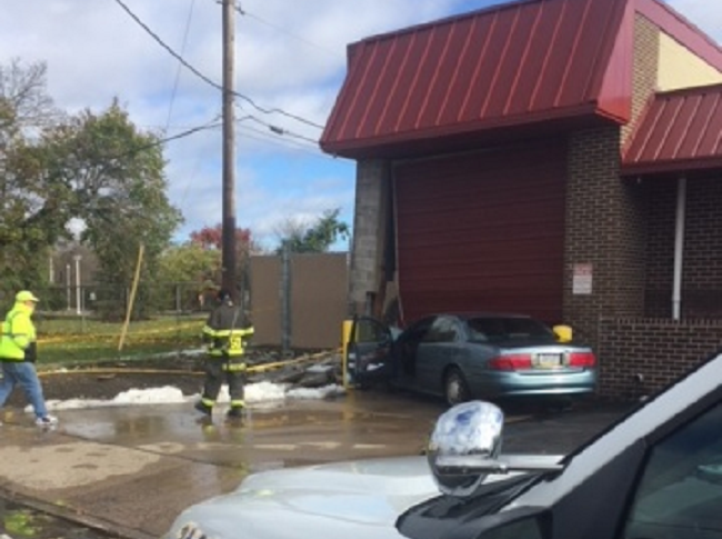 Building Heavily Damaged After Strike By Car