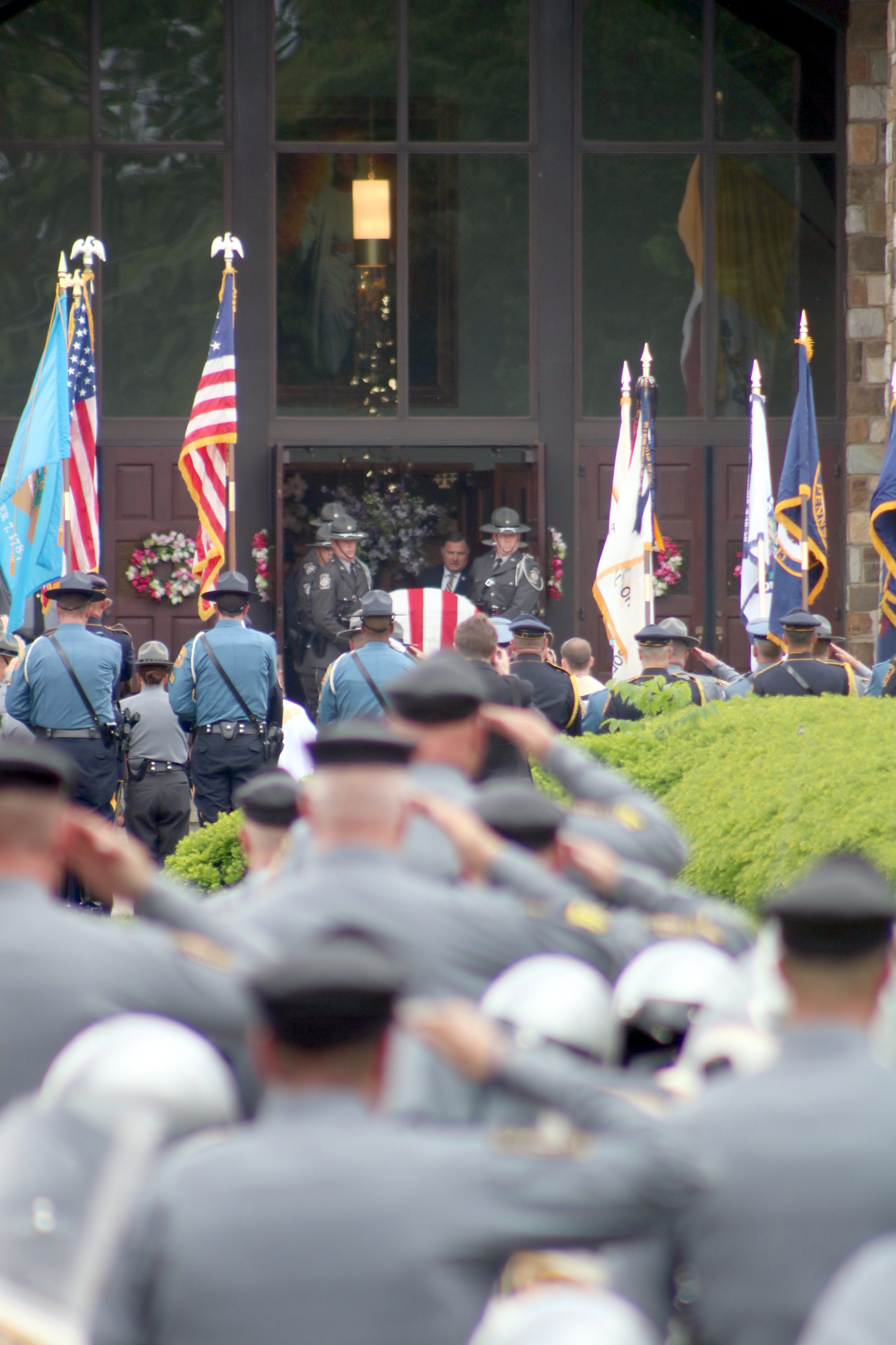Solemn Salute For Fallen Trooper