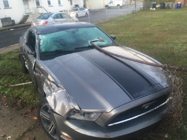 Metal Pole Barely Misses Man During Crash
