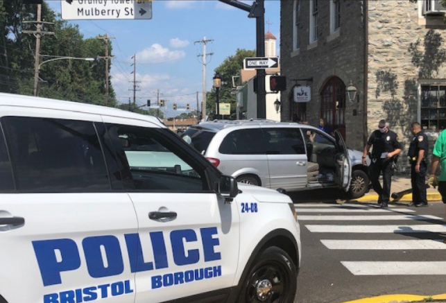 Light Pole Downed By Minivan