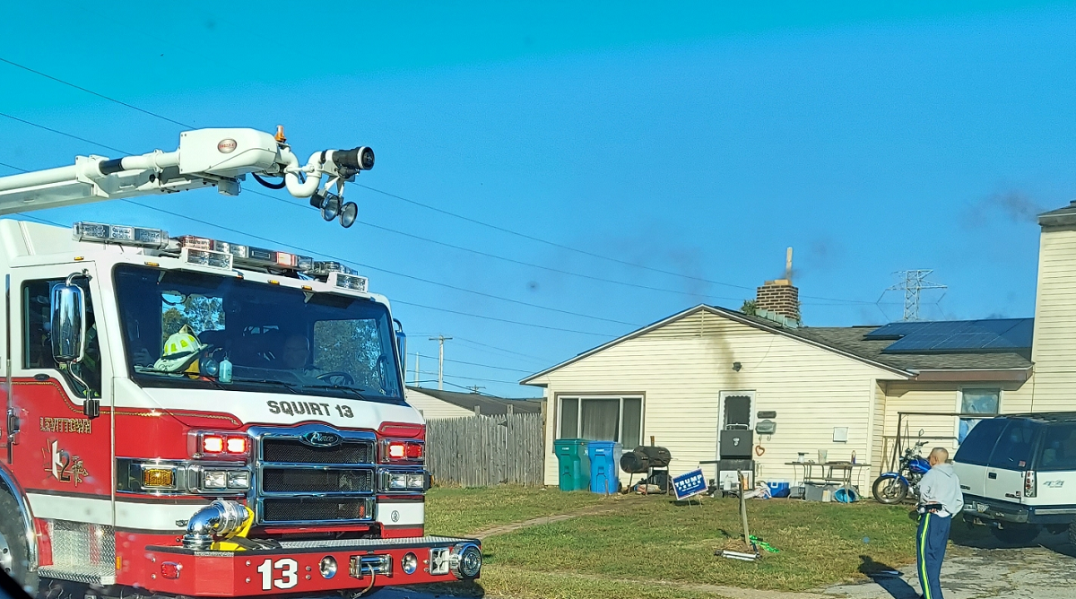 Firefighters Find Dogs During House Blaze