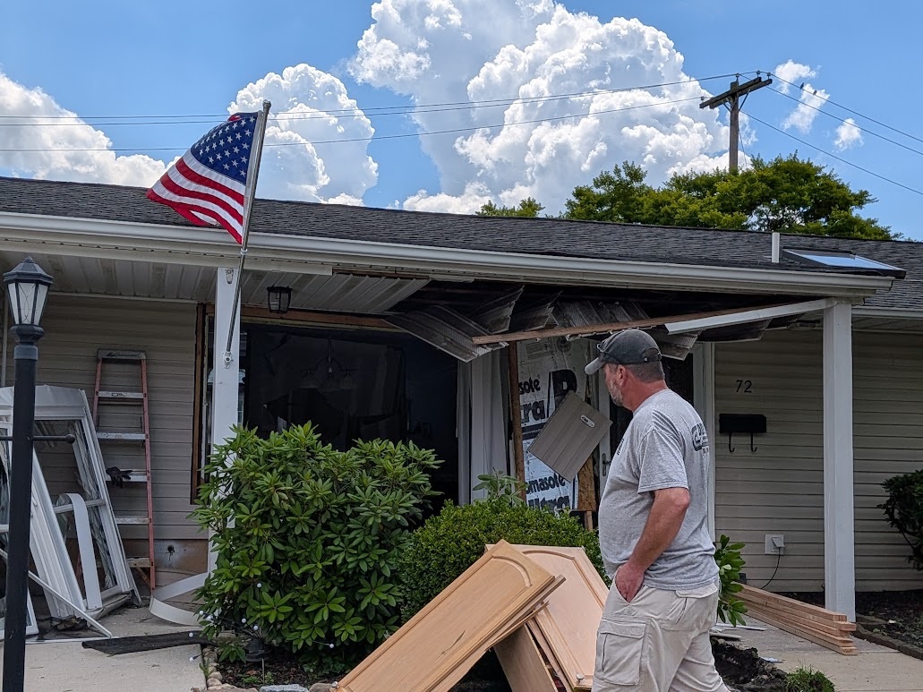 Woman Taken By Police After Slamming Car Into Home